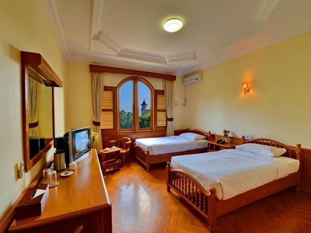 Win Unity Hotel Pyin Oo Lwin Buitenkant foto