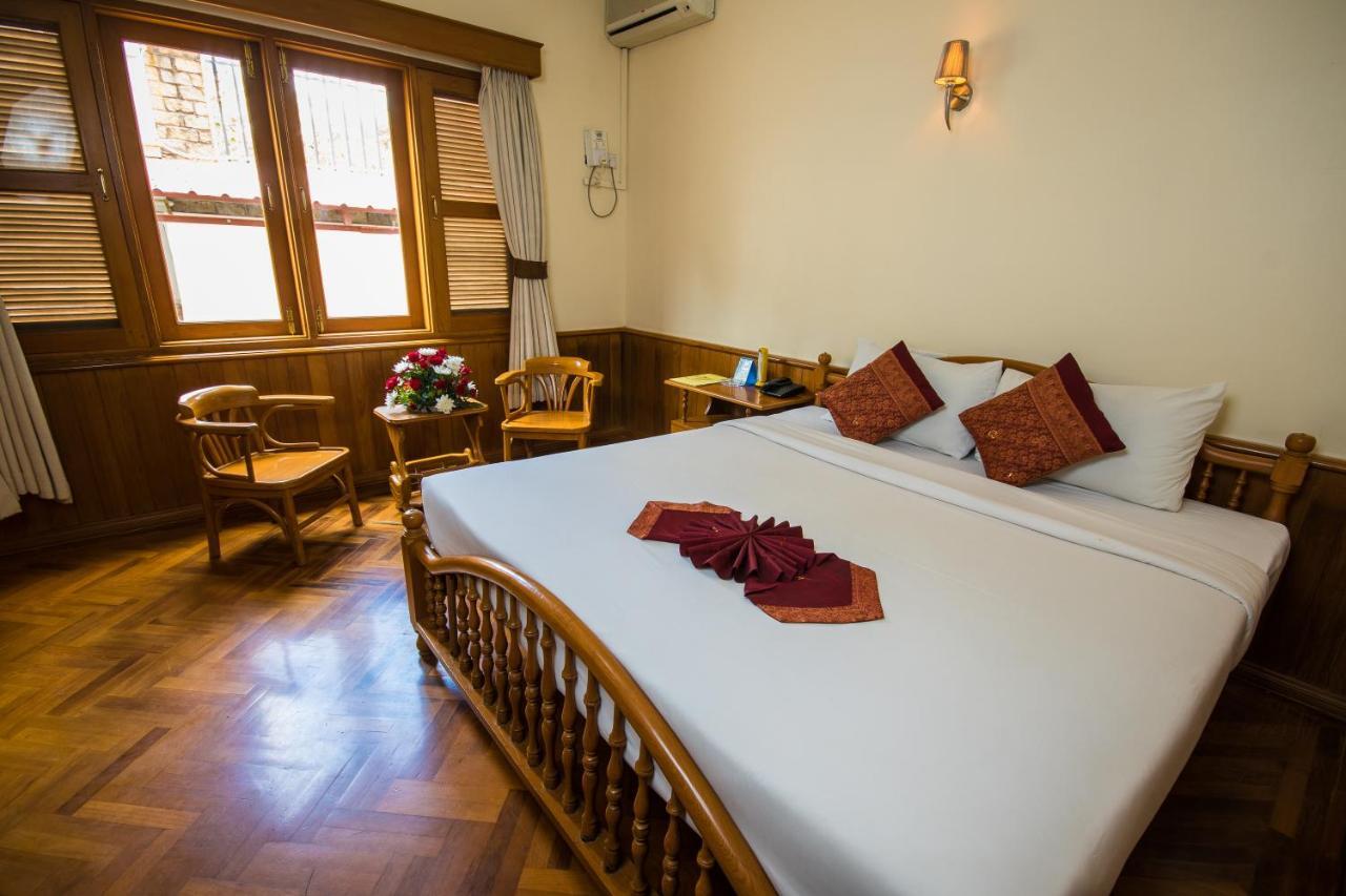 Win Unity Hotel Pyin Oo Lwin Buitenkant foto
