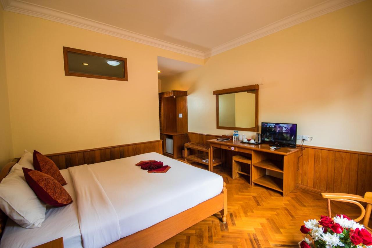 Win Unity Hotel Pyin Oo Lwin Buitenkant foto